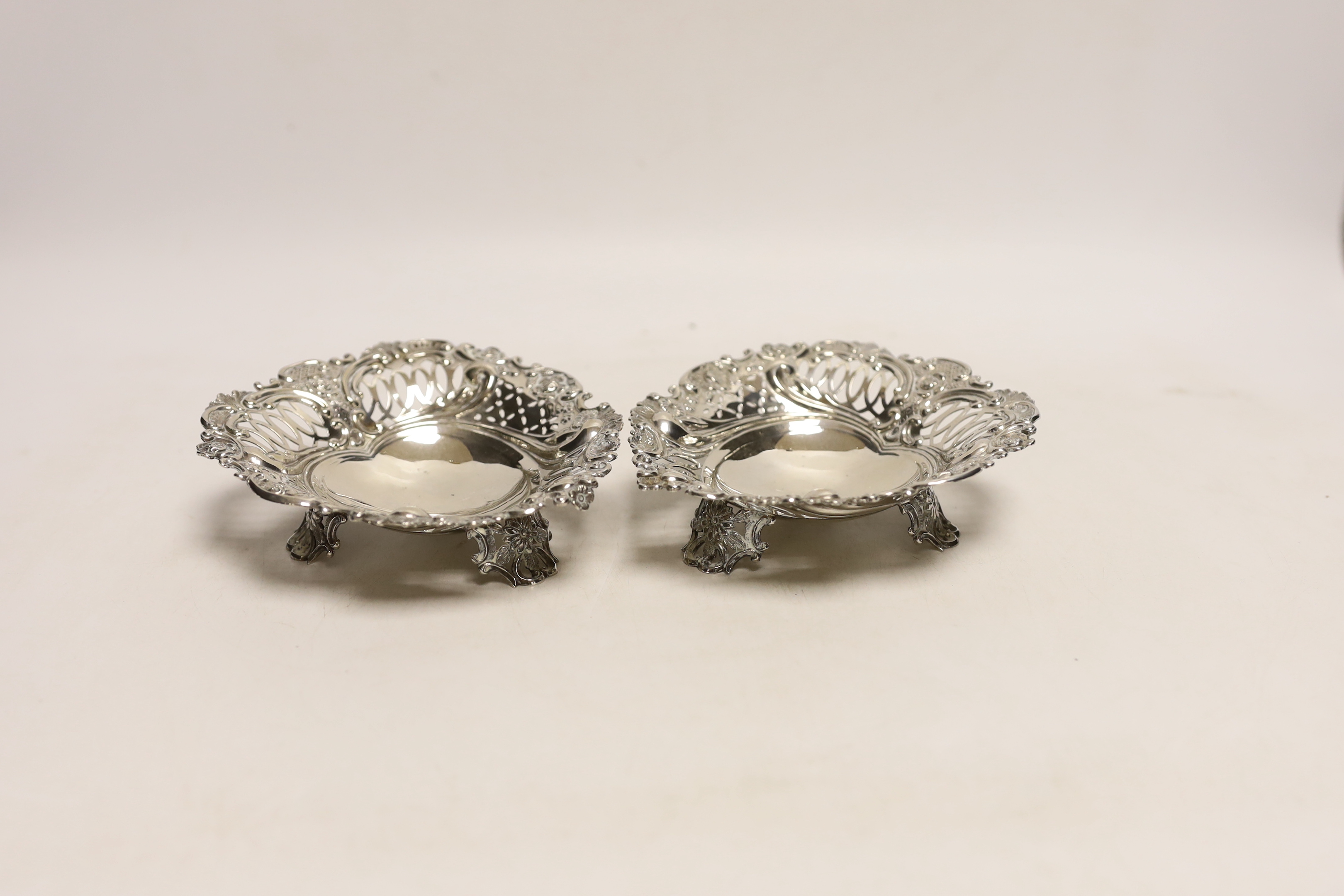 A pair of late Victorian Scottish pierced silver bonbon dishes, Hamilton & Inches, Edinburgh, 1893, 13.2cm, 6.5oz.